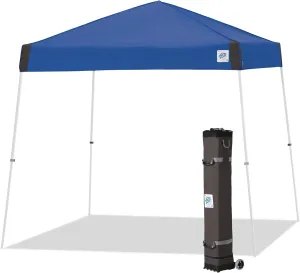 E-Z UP Vista Instant Shelter Canopy, 12' x 12', White Powder-Coated Steel Frame with Wide-Trax Roller Bag & 4 Piece Spike Set, Royal Blue