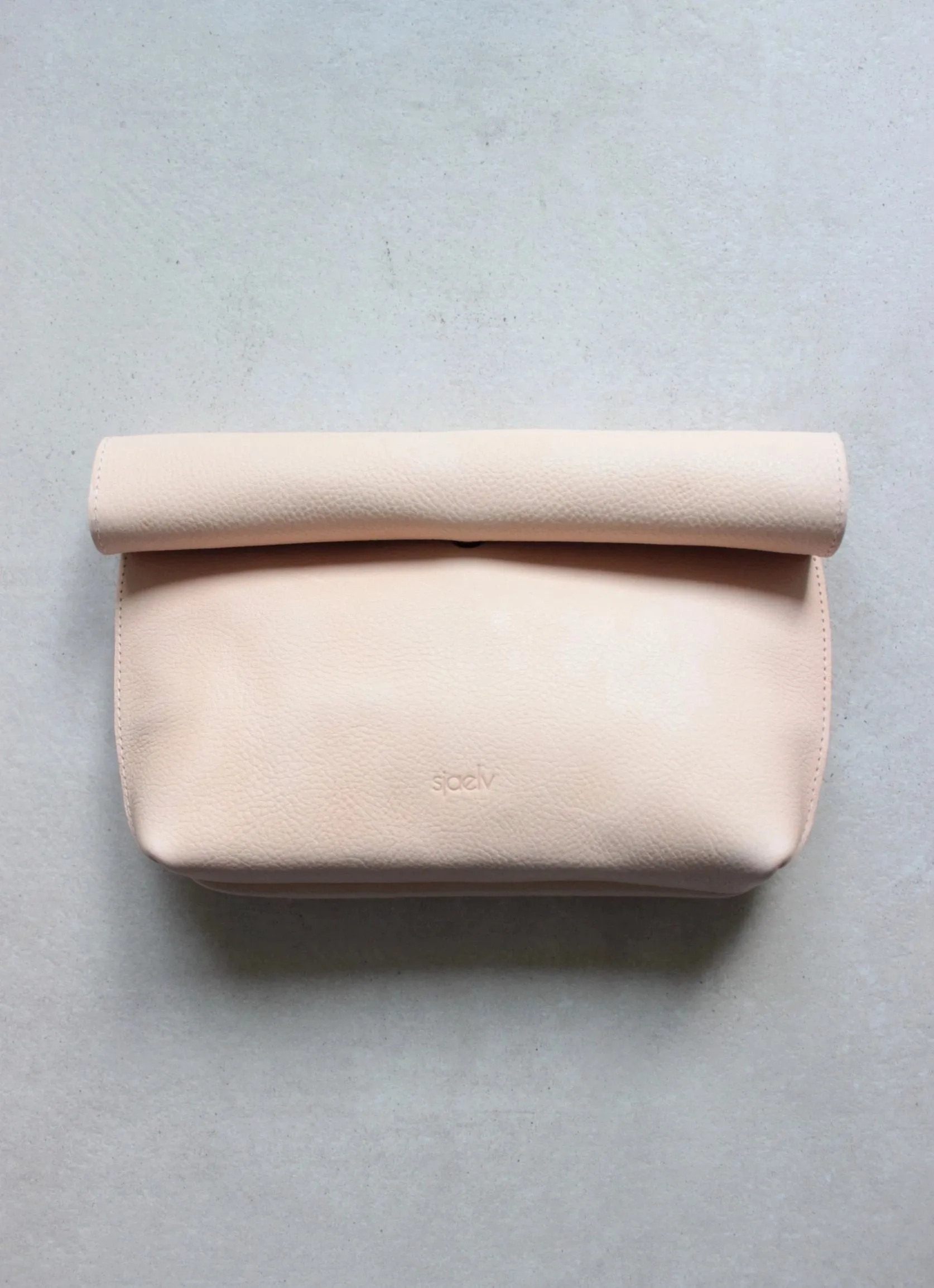 Roll top clutch nude