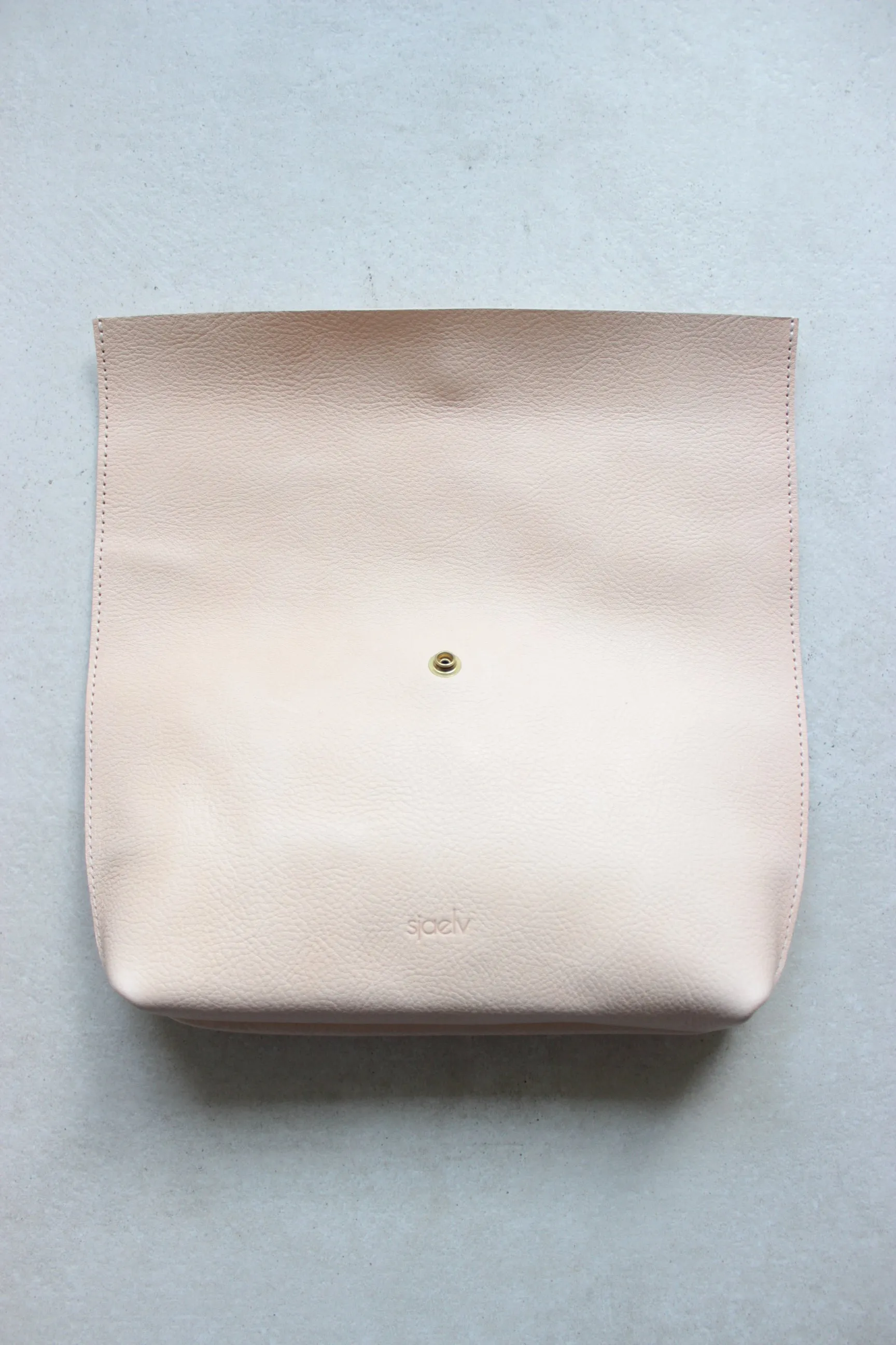 Roll top clutch nude