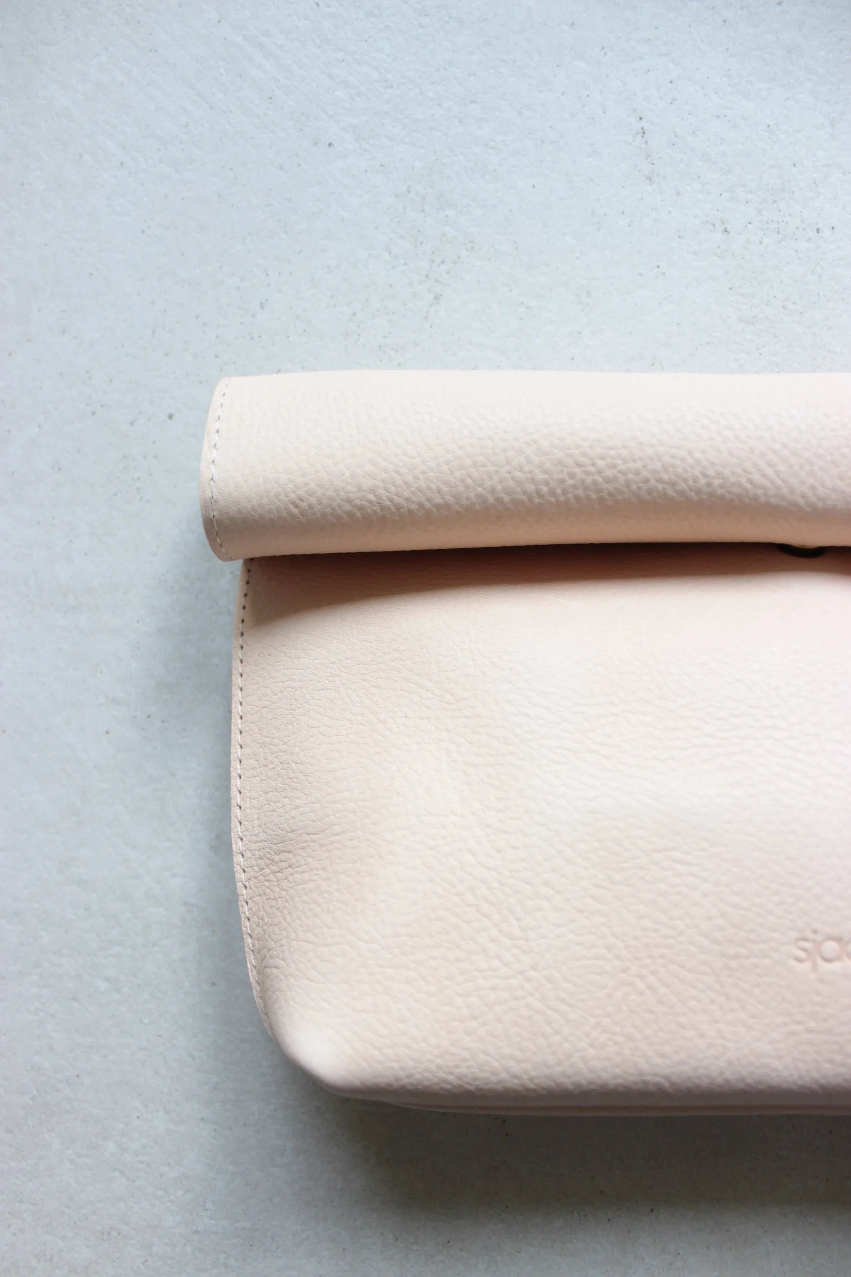 Roll top clutch nude