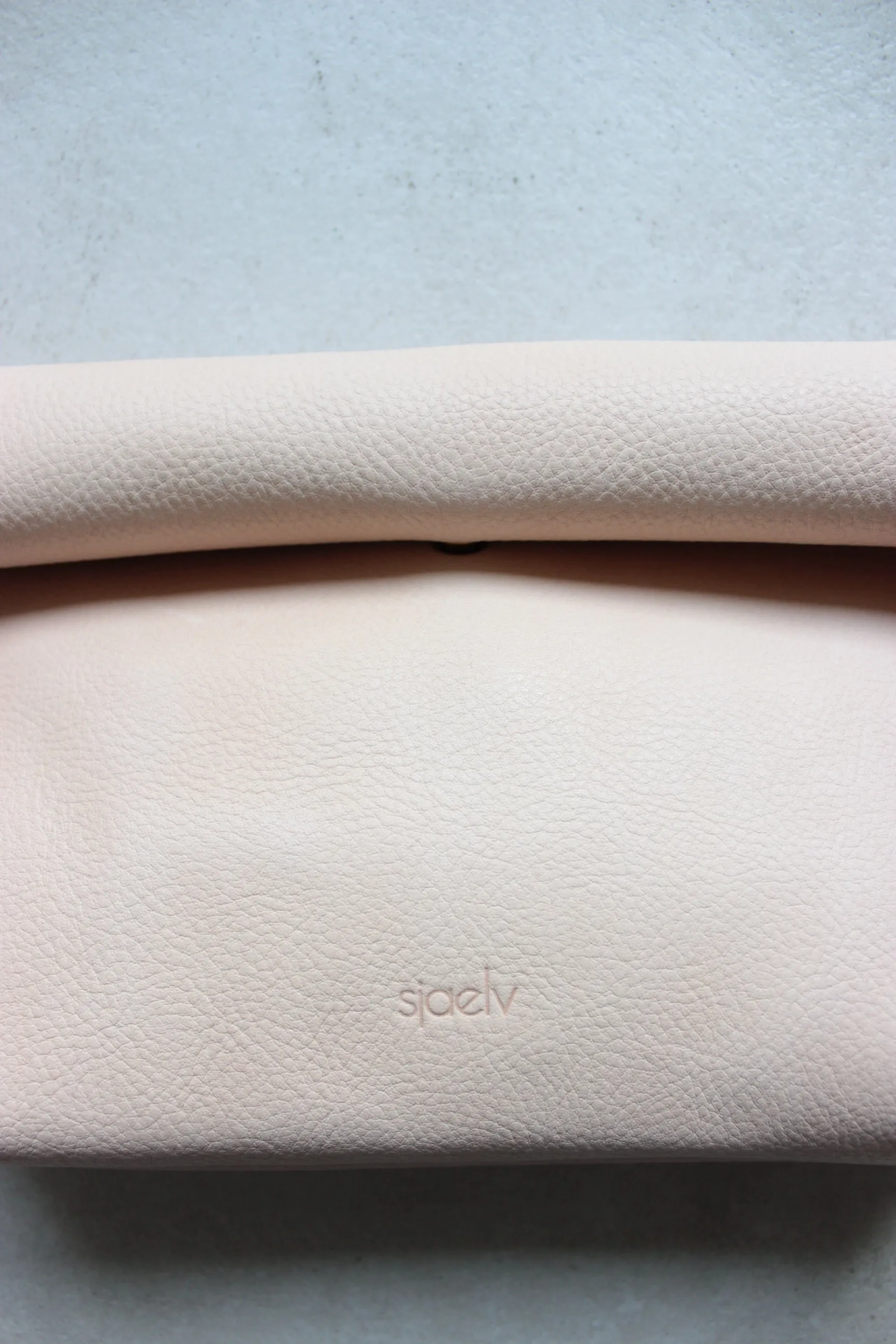 Roll top clutch nude
